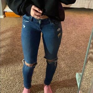 Low rise knee cut jeans